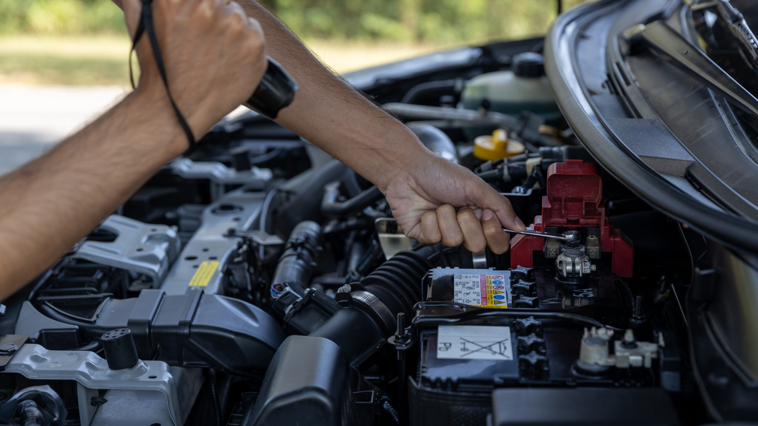 man-is-checking-car-battery-because-car-battery-i-2023-11-27-05-07-53-utc