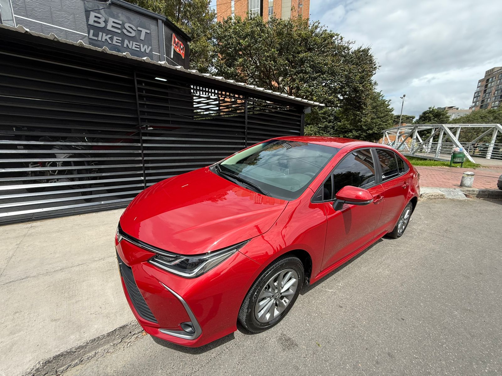 Toyota Corolla XEI 2022 rojo usado en Bogotá concesionario Autosmetromovil
